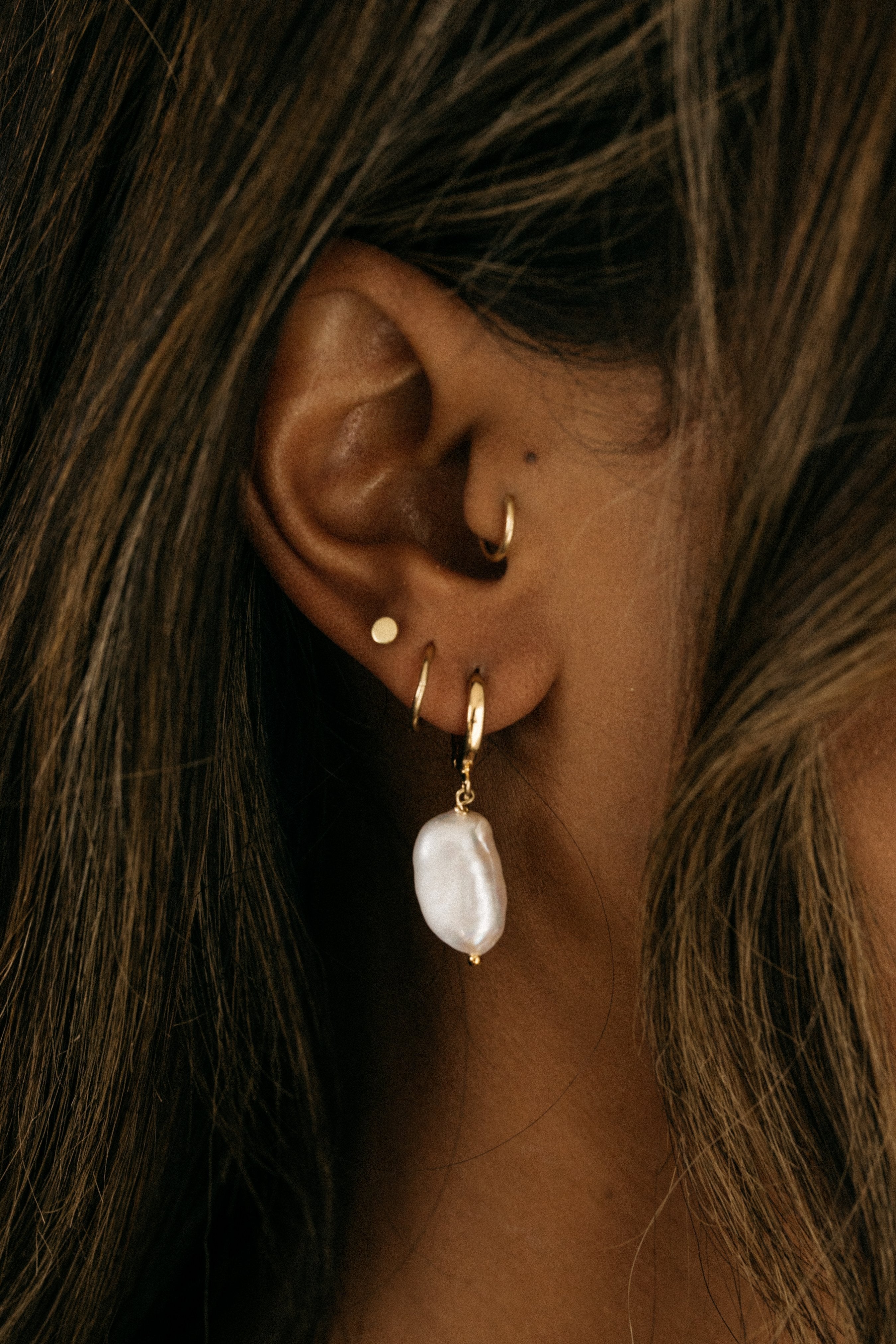 Elegance In Motion: Baroque Pearl Earrings